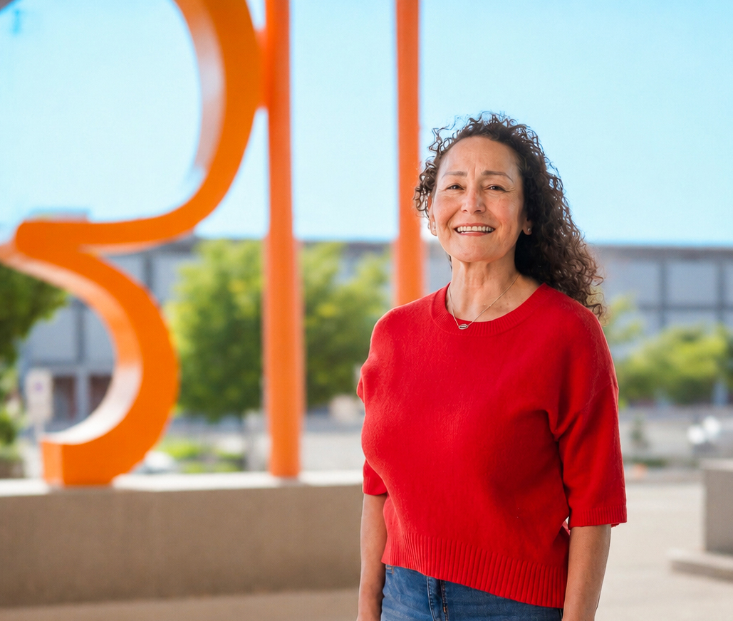 Smiling woman standing outdoors